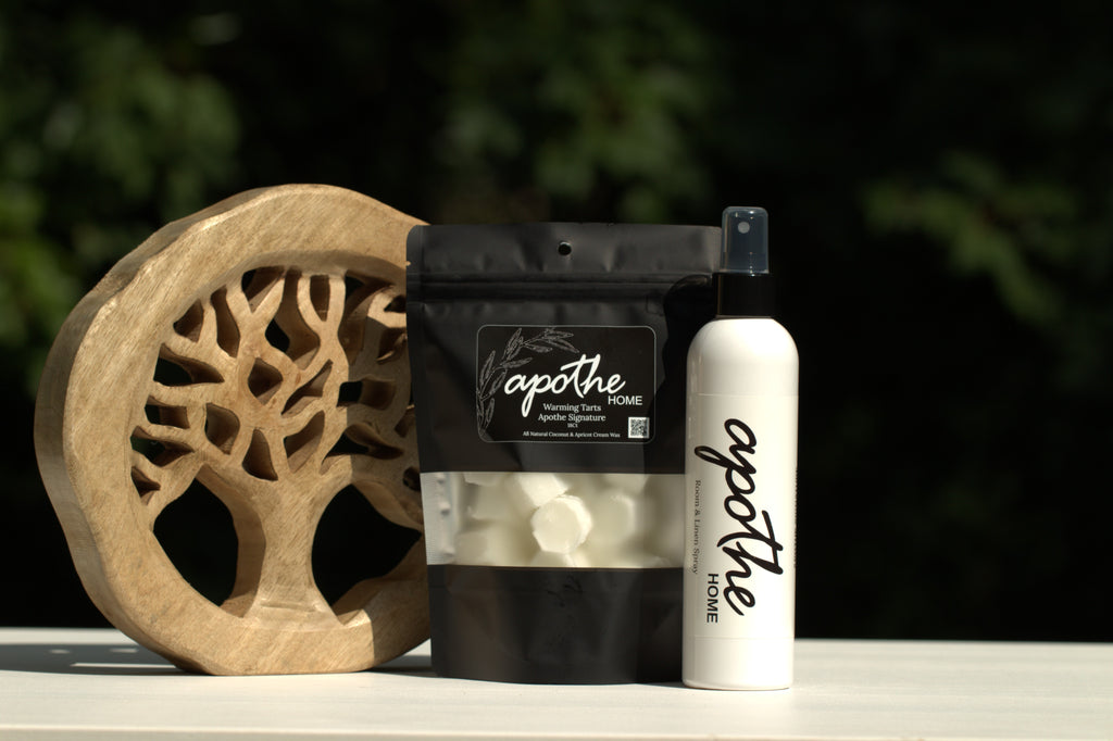Apothe Bag of Warming Tarts in Apothe Signature Scent and a bottle of the Apothe Signature Scent Room Spray.