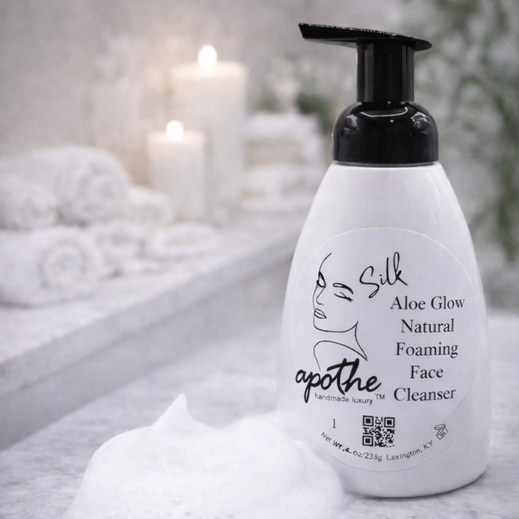 Foaming face cleanser bottle with pump on a textured surface, blurred background