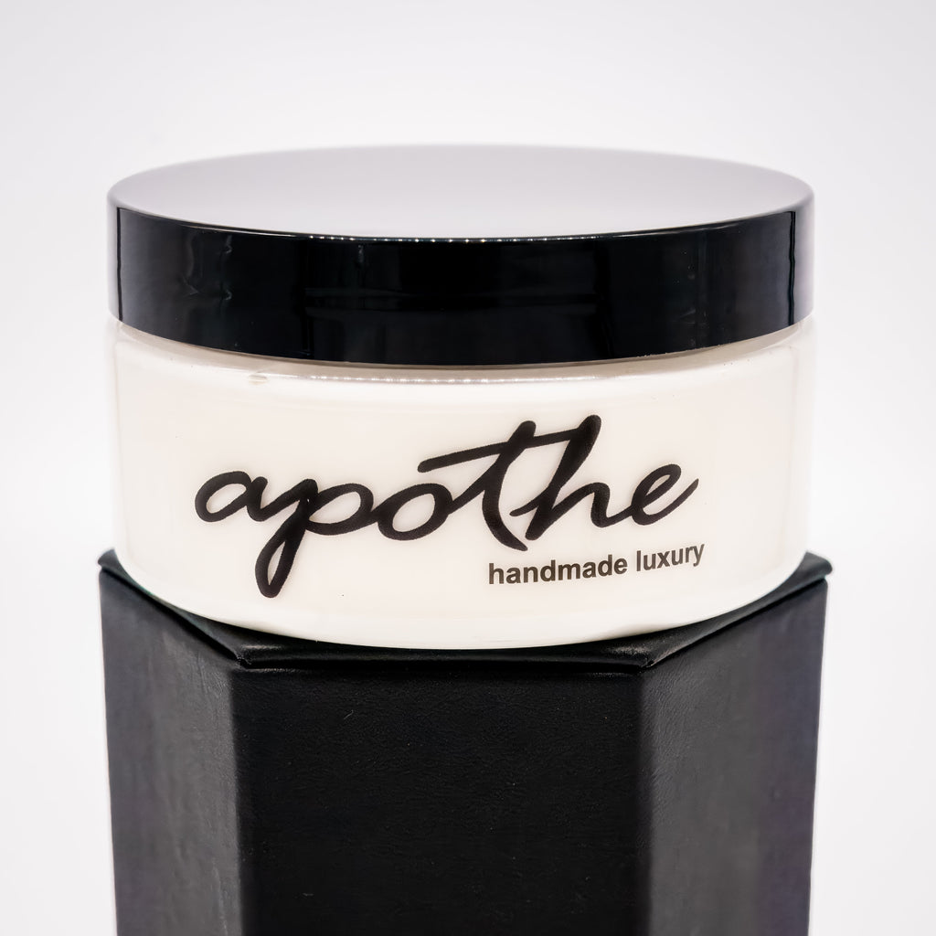 A jar of our luxuriously creamy white body butter featuring mango and shea butters with rich, healing jojoba oil. Ultra-nourishing formula designed to moisturize, soothe and rejuvenate.