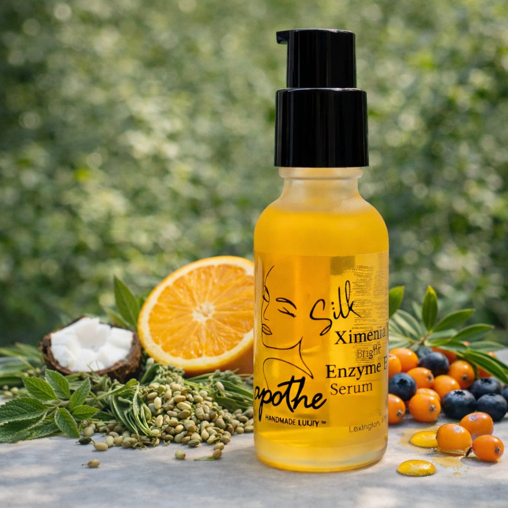 'Apothe' golden serum bottle with black cap on a natural background with fruits botanicals and plants